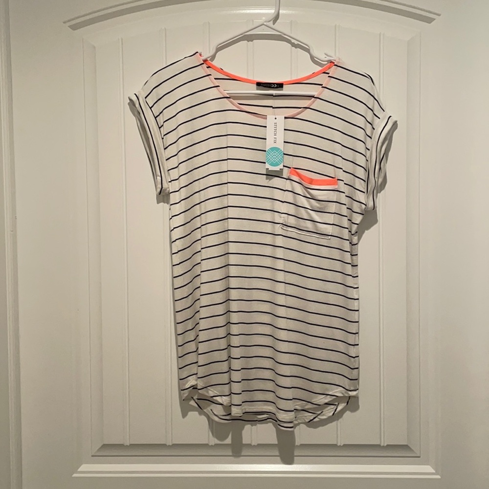 Button back, striped shirt.